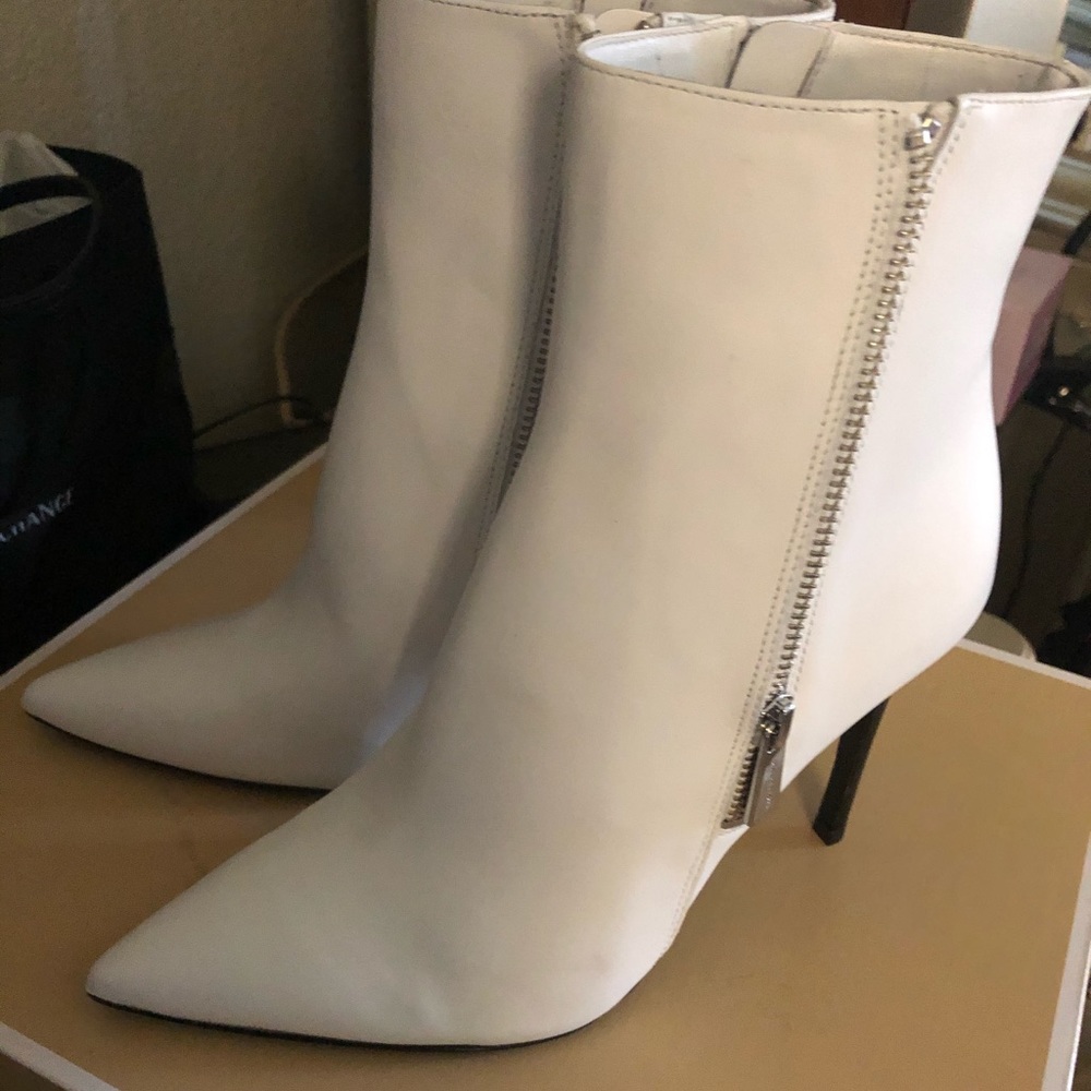 SOLD brand new with micheal kor white ankle boots